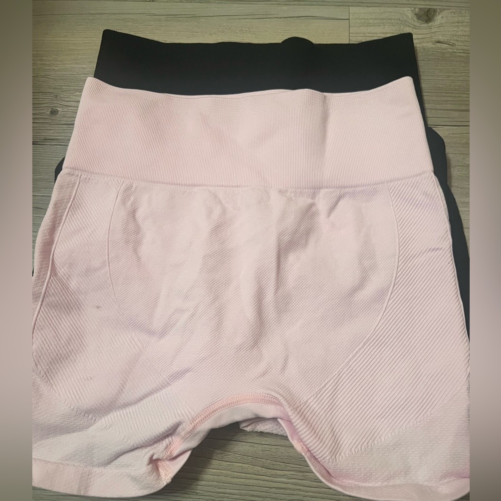 two pairs of gym shorts